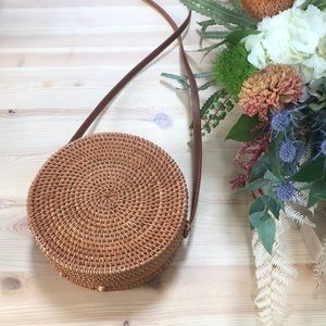 Rattan purse with leather details
